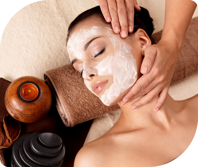 Woman receiving a relaxing facial treatment at Facials & Skincare by Debbie in Orange, CA.