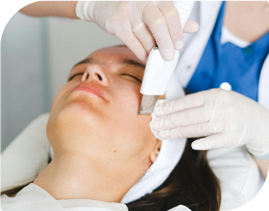 Woman receiving a Micro/Sonic Infused Facial at Facials & Skincare by Debbie, Orange, CA