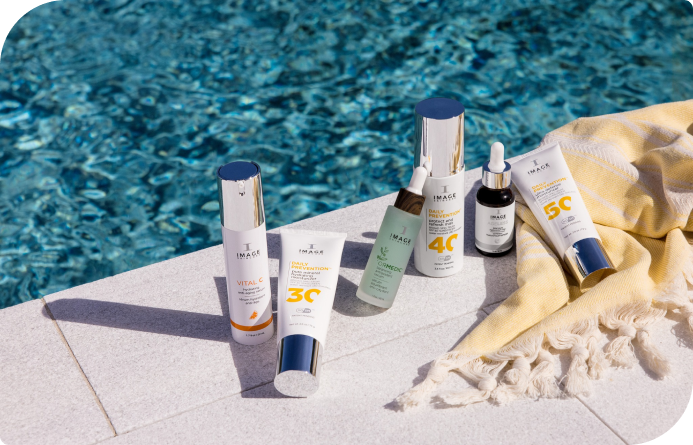 Image Skincare products displayed by the pool, showcasing innovative skincare solutions for radiant, healthy skin.